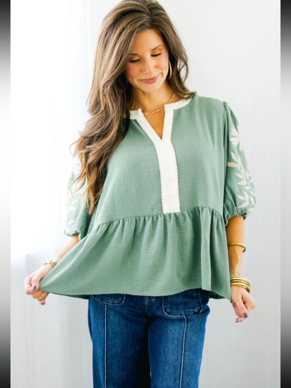 1228.  Green embroidered puff sleeve peplum top